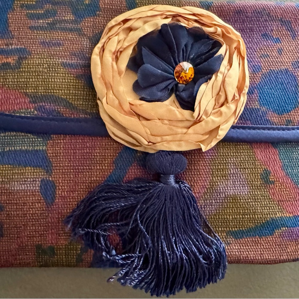 Colorful Clutch with Tassel and Floral Accent